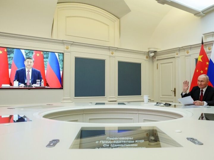 أوشاكوف: شي دعا بوتين لزيارة الصين